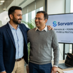 Sarvam AI founders Vivek Raghavan and Pratyush Kumar at a tech summit in India.